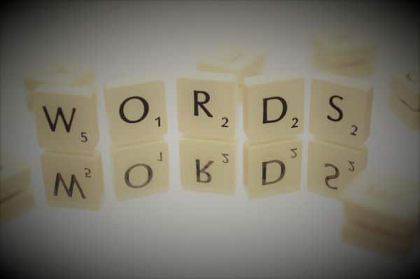 "Scrabble tiles spelling WORDS"